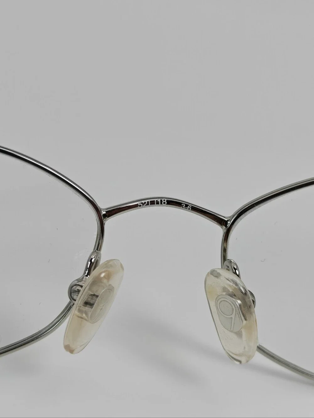 Nine West. 308. Silver Oval Wireframe. Ivory Grey Tortoise Front.